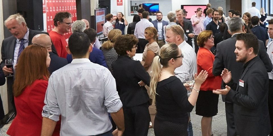 Attendees networking at a Launchpad event.