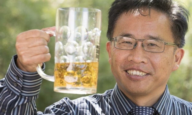 researcher with beer