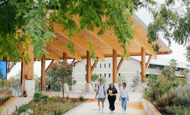 Three Murdoch University students outside Boola Katitjin