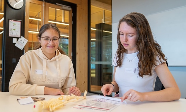 two students in classroom