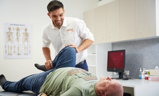 A patient being treated at the Murdoch Chiropractic Clinic.