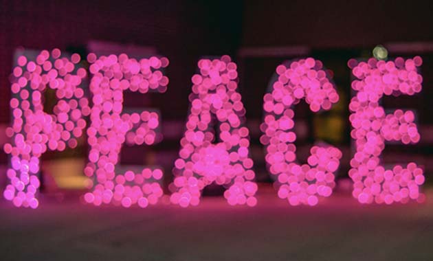 'PEACE' made from pink lights