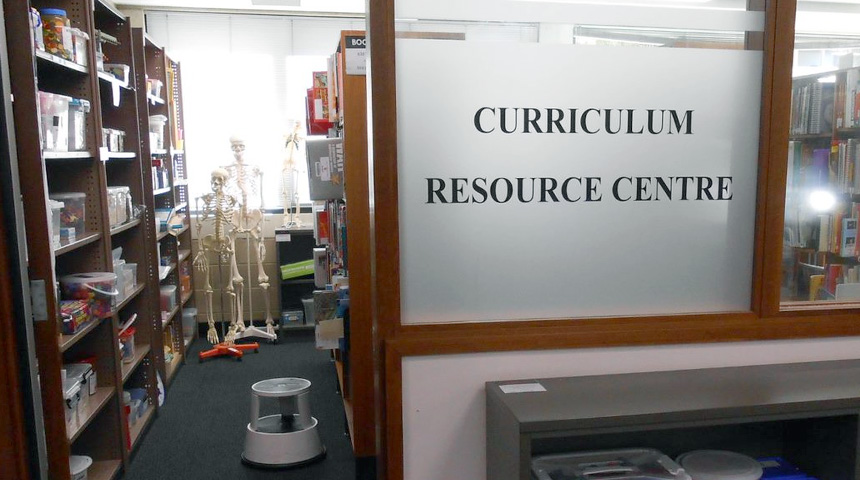 Curriculum Resource Centre entrance showing books, educational items.