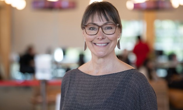 Murdoch University's Anna Copeland smiling at the camera inside Boola Katitjin