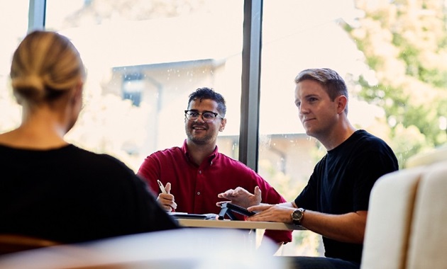 Business people have a meeting in a cafe