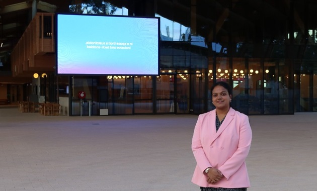 Jyothi standing in front of Boola Katitjin