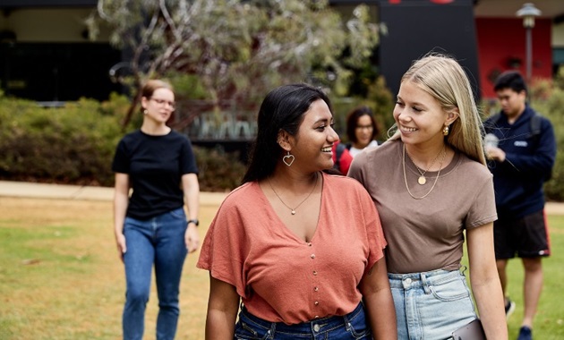 Murdoch student Natalie walking in Bush Court