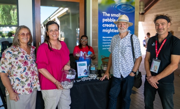 Jaki Richardson,  Ana Terrazas and Paul Hansen from The Wetlands Centre with Dr Martin Breuckner at the Open Day Giving stand