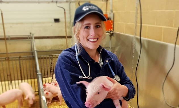 Issy Campbell with pig