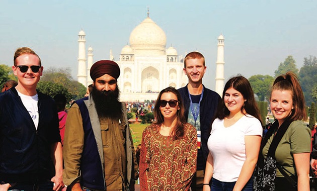 Law students posing in front of the Taj Mahal