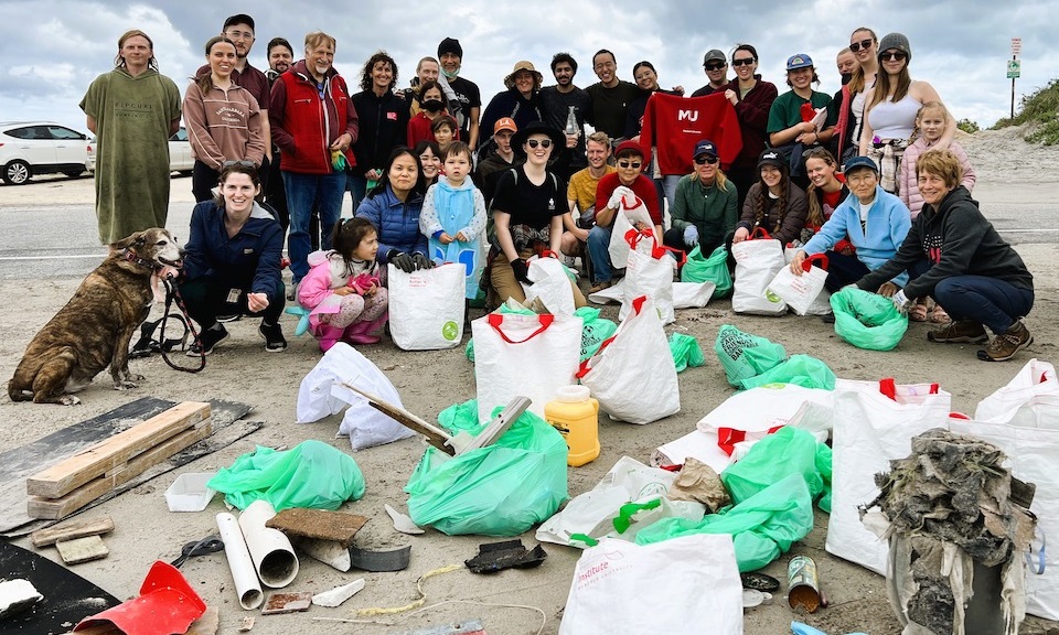 group of students on beach cleanup